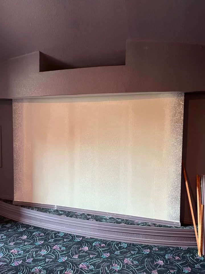 The same opening closed with new drywall, finished and blended
